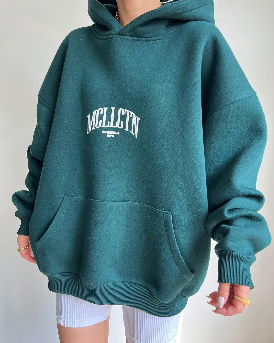 Women's Long Sleeved Hooded Sweater