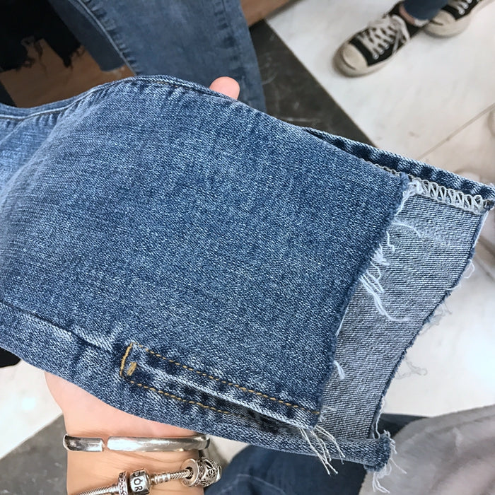 Cropped jeans with high-waist ripped pants